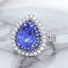 Load image into Gallery viewer, 6.08ct Pear Shaped Blue Sapphire Ring with Sapphire and Diamond halo in 18K White Gold