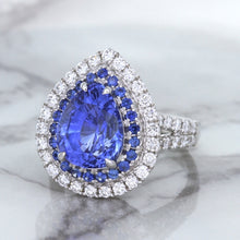Load image into Gallery viewer, 6.08ct Pear Shaped Blue Sapphire Ring with Sapphire and Diamond halo in 18K White Gold