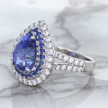 Load image into Gallery viewer, 6.08ct Pear Shaped Blue Sapphire Ring with Sapphire and Diamond halo in 18K White Gold