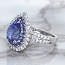 Load image into Gallery viewer, 6.08ct Pear Shaped Blue Sapphire Ring with Sapphire and Diamond halo in 18K White Gold