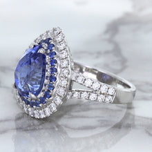 Load image into Gallery viewer, 6.08ct Pear Shaped Blue Sapphire Ring with Sapphire and Diamond halo in 18K White Gold