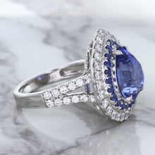 Load image into Gallery viewer, 6.08ct Pear Shaped Blue Sapphire Ring with Sapphire and Diamond halo in 18K White Gold