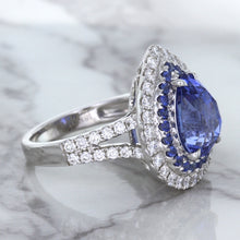 Load image into Gallery viewer, 6.08ct Pear Shaped Blue Sapphire Ring with Sapphire and Diamond halo in 18K White Gold