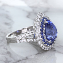 Load image into Gallery viewer, 6.08ct Pear Shaped Blue Sapphire Ring with Sapphire and Diamond halo in 18K White Gold