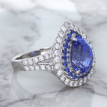 Load image into Gallery viewer, 6.08ct Pear Shaped Blue Sapphire Ring with Sapphire and Diamond halo in 18K White Gold
