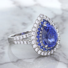Load image into Gallery viewer, 6.08ct Pear Shaped Blue Sapphire Ring with Sapphire and Diamond halo in 18K White Gold
