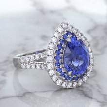 Load image into Gallery viewer, 6.08ct Pear Shaped Blue Sapphire Ring with Sapphire and Diamond halo in 18K White Gold