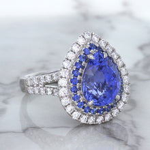 Load image into Gallery viewer, 6.08ct Pear Shaped Blue Sapphire Ring with Sapphire and Diamond halo in 18K White Gold