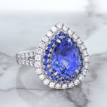 Load image into Gallery viewer, 6.08ct Pear Shaped Blue Sapphire Ring with Sapphire and Diamond halo in 18K White Gold