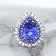 Load image into Gallery viewer, 6.08ct Pear Shaped Blue Sapphire Ring with Sapphire and Diamond halo in 18K White Gold
