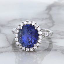 Load image into Gallery viewer, 7.86ct Oval Blue Sapphirewith diamond halo in 18K White Gold