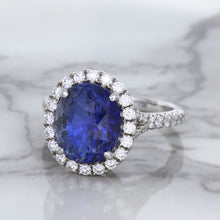 Load image into Gallery viewer, 7.86ct Oval Blue Sapphirewith diamond halo in 18K White Gold