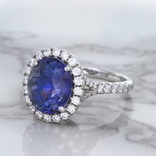 Load image into Gallery viewer, 7.86ct Oval Blue Sapphirewith diamond halo in 18K White Gold