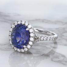 Load image into Gallery viewer, 7.86ct Oval Blue Sapphirewith diamond halo in 18K White Gold