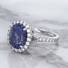 Load image into Gallery viewer, 7.86ct Oval Blue Sapphirewith diamond halo in 18K White Gold