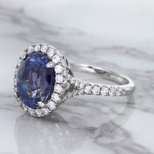 Load image into Gallery viewer, 7.86ct Oval Blue Sapphirewith diamond halo in 18K White Gold