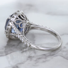 Load image into Gallery viewer, 7.86ct Oval Blue Sapphirewith diamond halo in 18K White Gold