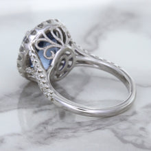Load image into Gallery viewer, 7.86ct Oval Blue Sapphirewith diamond halo in 18K White Gold