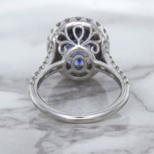 Load image into Gallery viewer, 7.86ct Oval Blue Sapphirewith diamond halo in 18K White Gold