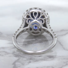 Load image into Gallery viewer, 7.86ct Oval Blue Sapphirewith diamond halo in 18K White Gold