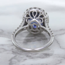 Load image into Gallery viewer, 7.86ct Oval Blue Sapphirewith diamond halo in 18K White Gold
