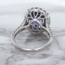 Load image into Gallery viewer, 7.86ct Oval Blue Sapphirewith diamond halo in 18K White Gold