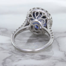 Load image into Gallery viewer, 7.86ct Oval Blue Sapphirewith diamond halo in 18K White Gold