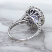 Load image into Gallery viewer, 7.86ct Oval Blue Sapphirewith diamond halo in 18K White Gold