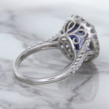 Load image into Gallery viewer, 7.86ct Oval Blue Sapphirewith diamond halo in 18K White Gold