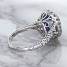 Load image into Gallery viewer, 7.86ct Oval Blue Sapphirewith diamond halo in 18K White Gold