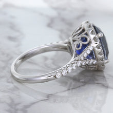 Load image into Gallery viewer, 7.86ct Oval Blue Sapphirewith diamond halo in 18K White Gold