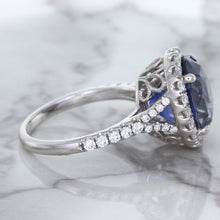 Load image into Gallery viewer, 7.86ct Oval Blue Sapphirewith diamond halo in 18K White Gold