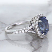 Load image into Gallery viewer, 7.86ct Oval Blue Sapphirewith diamond halo in 18K White Gold