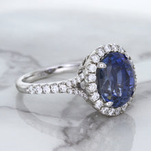 Load image into Gallery viewer, 7.86ct Oval Blue Sapphirewith diamond halo in 18K White Gold