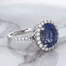 Load image into Gallery viewer, 7.86ct Oval Blue Sapphirewith diamond halo in 18K White Gold