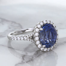 Load image into Gallery viewer, 7.86ct Oval Blue Sapphirewith diamond halo in 18K White Gold