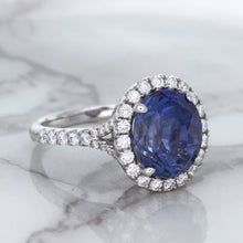 Load image into Gallery viewer, 7.86ct Oval Blue Sapphirewith diamond halo in 18K White Gold