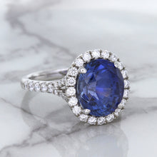 Load image into Gallery viewer, 7.86ct Oval Blue Sapphirewith diamond halo in 18K White Gold