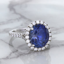 Load image into Gallery viewer, 7.86ct Oval Blue Sapphirewith diamond halo in 18K White Gold