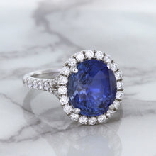 Load image into Gallery viewer, 7.86ct Oval Blue Sapphirewith diamond halo in 18K White Gold