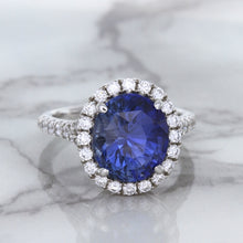 Load image into Gallery viewer, 7.86ct Oval Blue Sapphirewith diamond halo in 18K White Gold