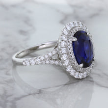 Load image into Gallery viewer, 3.75ct Oval Blue Sapphire Ring with Diamond Halo in 18K White Gold