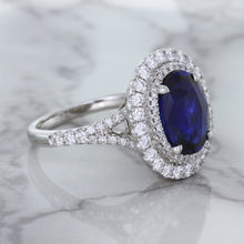 Load image into Gallery viewer, 3.75ct Oval Blue Sapphire Ring with Diamond Halo in 18K White Gold