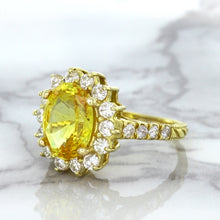 Load image into Gallery viewer, 4.04ct Oval Yellow Sapphire Ring with Diamond Halo in 14K Yellow Gold