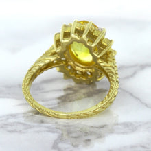 Load image into Gallery viewer, 4.04ct Oval Yellow Sapphire Ring with Diamond Halo in 14K Yellow Gold