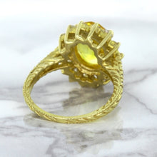 Load image into Gallery viewer, 4.04ct Oval Yellow Sapphire Ring with Diamond Halo in 14K Yellow Gold