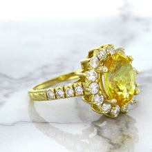 Load image into Gallery viewer, 4.04ct Oval Yellow Sapphire Ring with Diamond Halo in 14K Yellow Gold