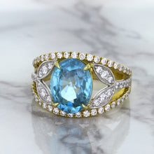 Load image into Gallery viewer, 5.29ct Oval Blue Zircon Ring with Diamond Accents in 18K Yellow Gold