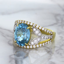 Load image into Gallery viewer, 5.29ct Oval Blue Zircon Ring with Diamond Accents in 18K Yellow Gold