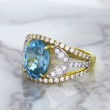 Load image into Gallery viewer, 5.29ct Oval Blue Zircon Ring with Diamond Accents in 18K Yellow Gold